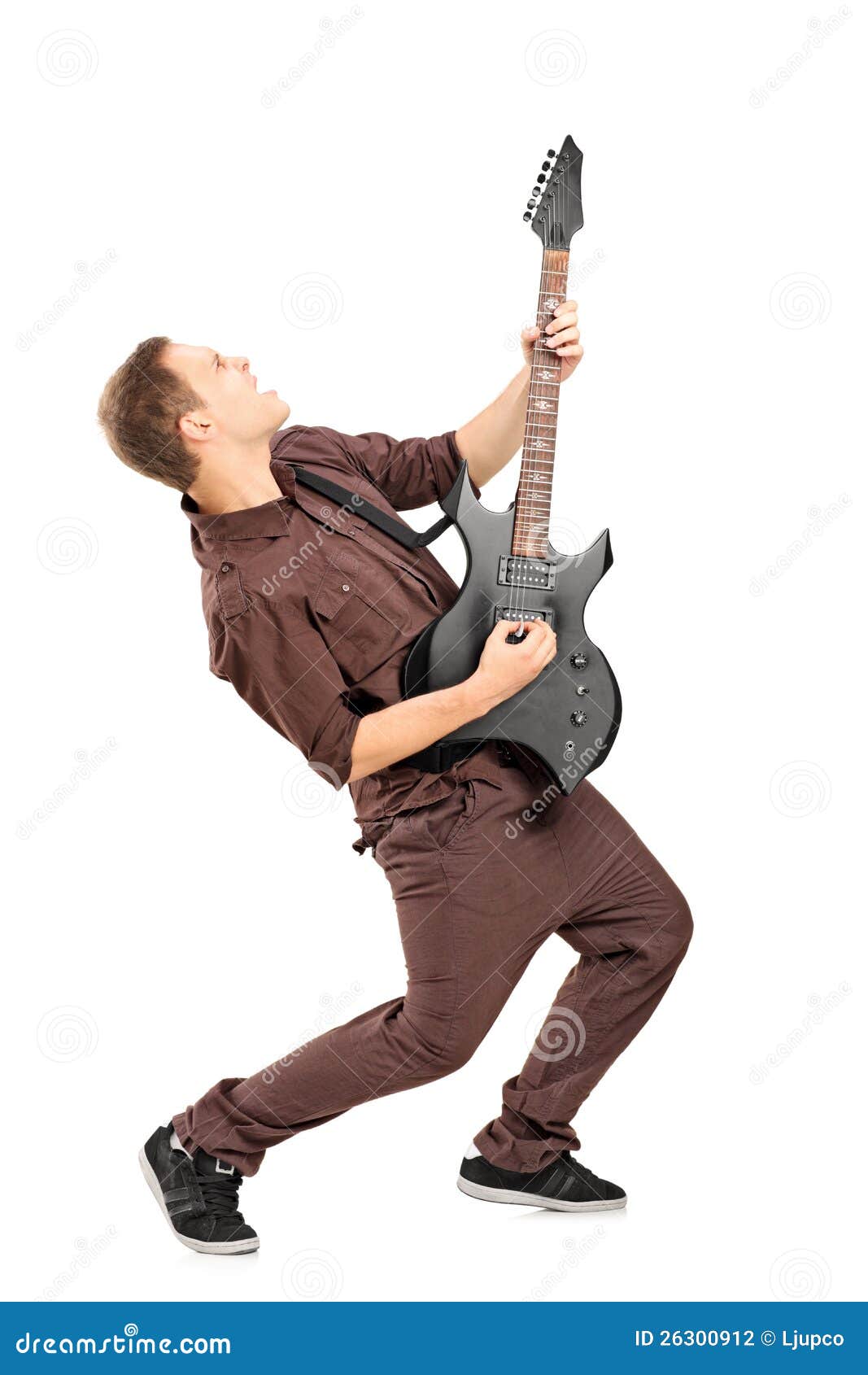Guitar man in classic rock pose Stock Photo by ©feedough 21940595