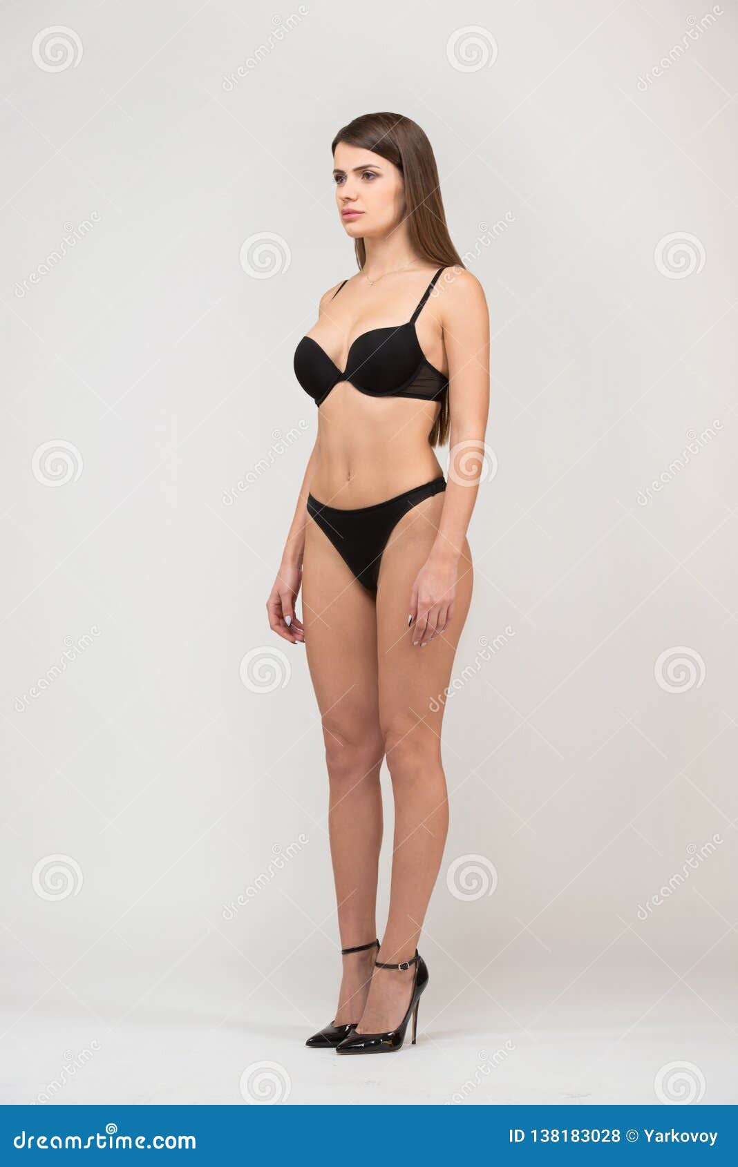 Three Quarter Portrait Beautiful Brunette Women Slim Figure Black Bra Stock  Photo by ©Yarkovoy 241905362