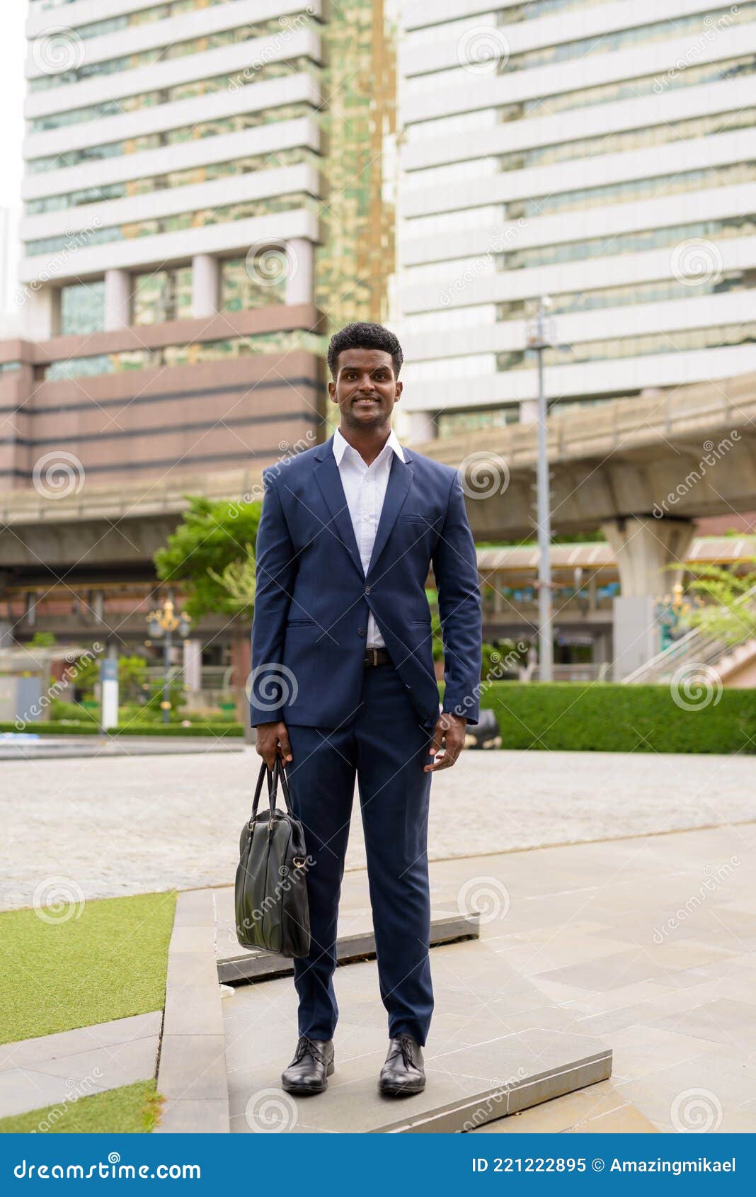 Full Length Shot of African Businessman Outdoors in City Smiling Stock ...