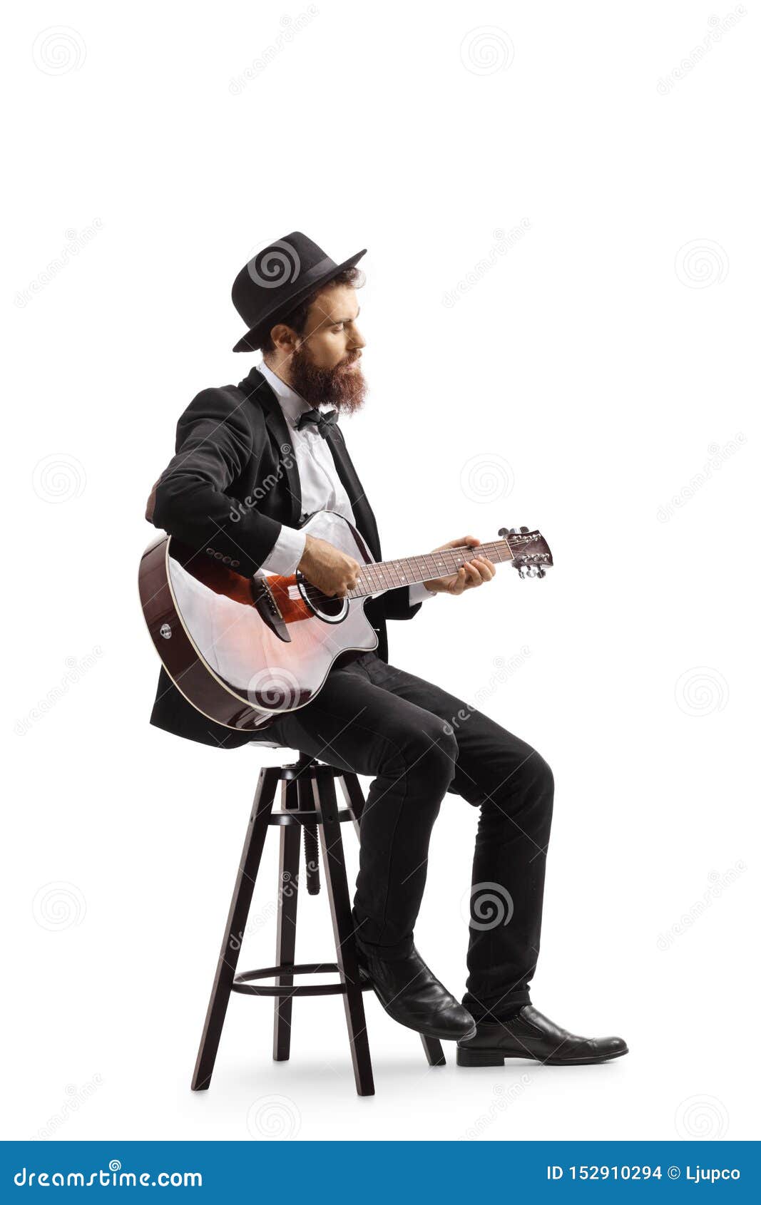 Man Sitting On A Chair And Playing An Acoustic Guitar Stock Photo Image Of Performing