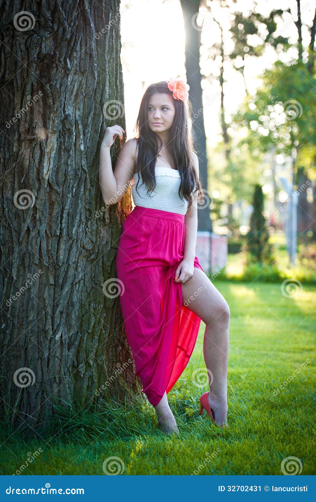 Full Length of Young Caucasian Female with Long Red Skirt Standing Near ...