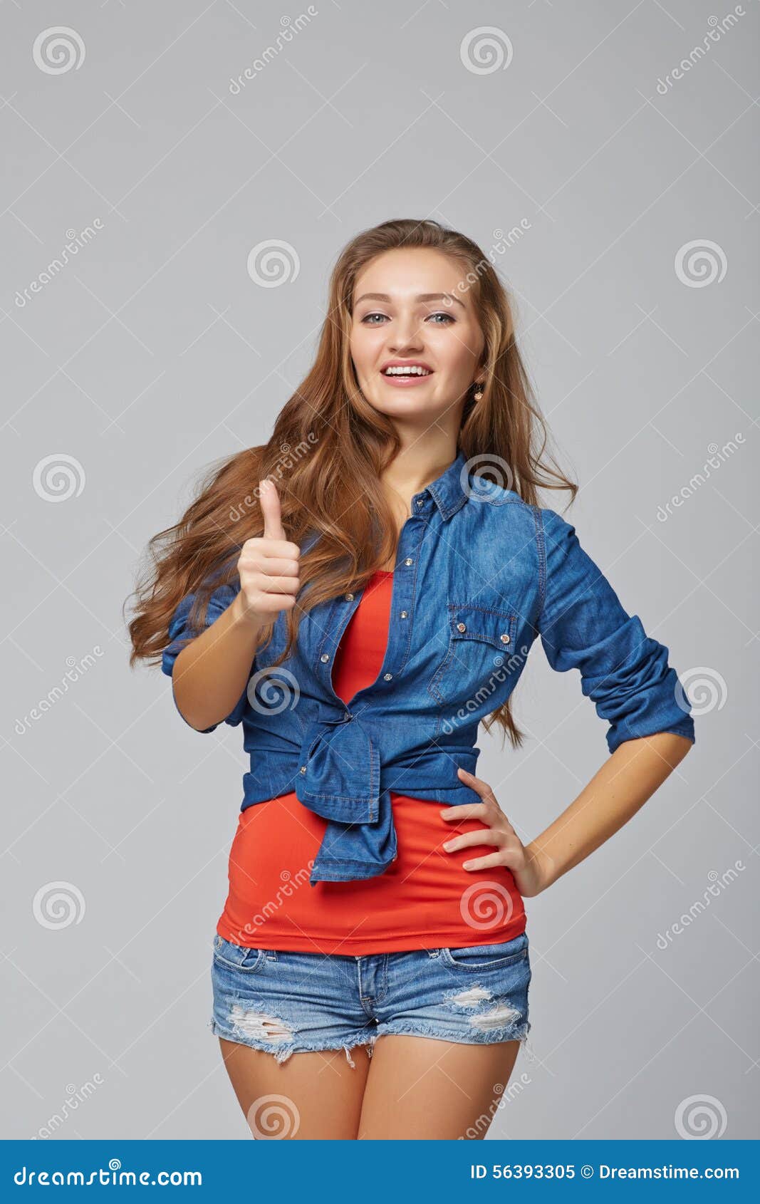 Full Length of Young Cute Smiling Emotional Girl Giving You Thumb Up ...