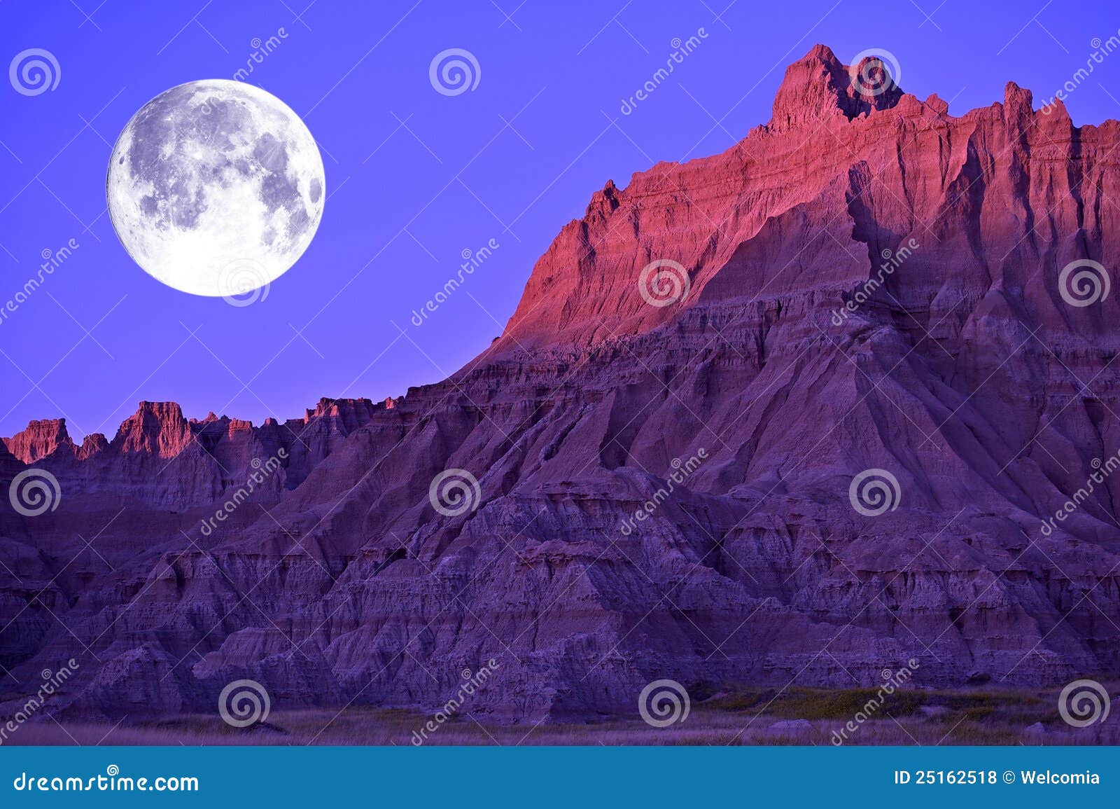 full moon in the badlands