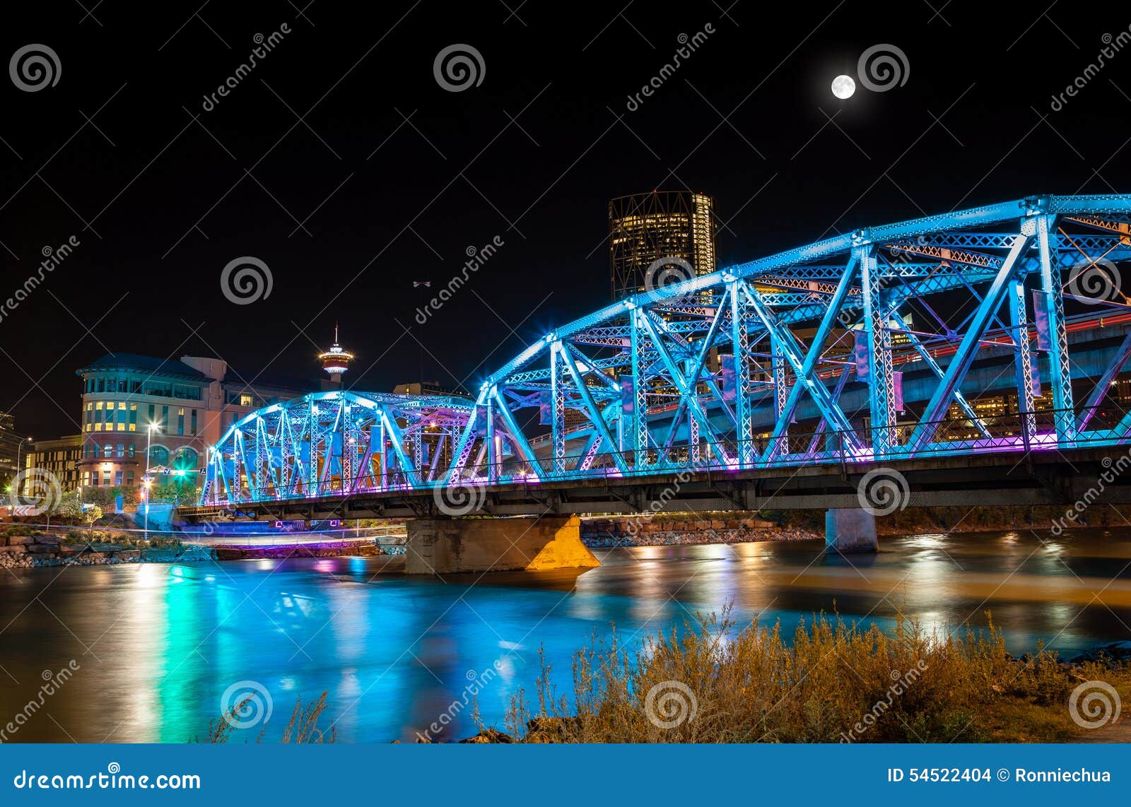 full moon over langevin bridge in downtown calgary