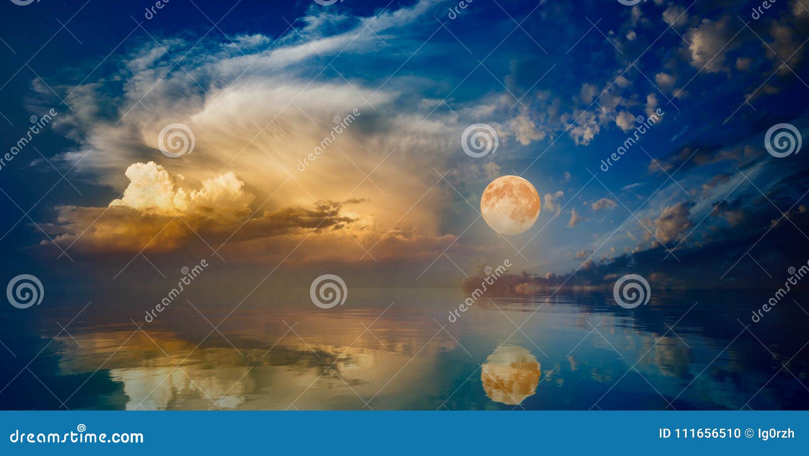 full moon rising above serene sea in sunset sky