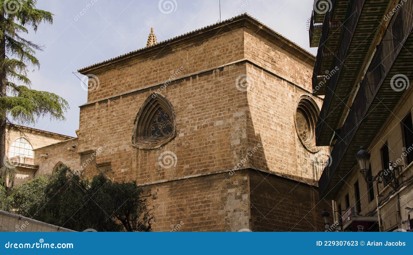 full pont de la mar, medieval bridge with towers and statues in valencia, spain