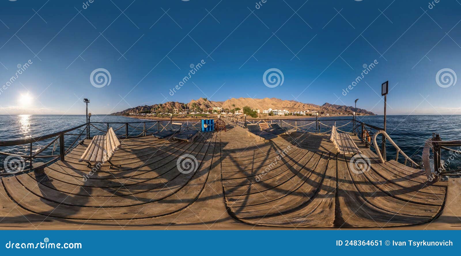 full seamless spherical hdr 360 panorama view on coast of sea with wooden pier and sun loungers by red sea in bright sunny day in