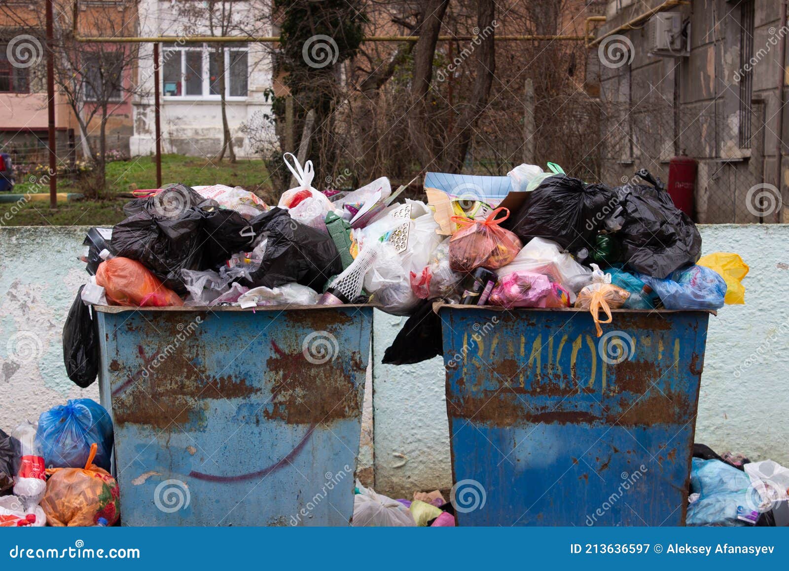 Full Trash Can. Trash Can Filled with Trash. Trash Can Packed To