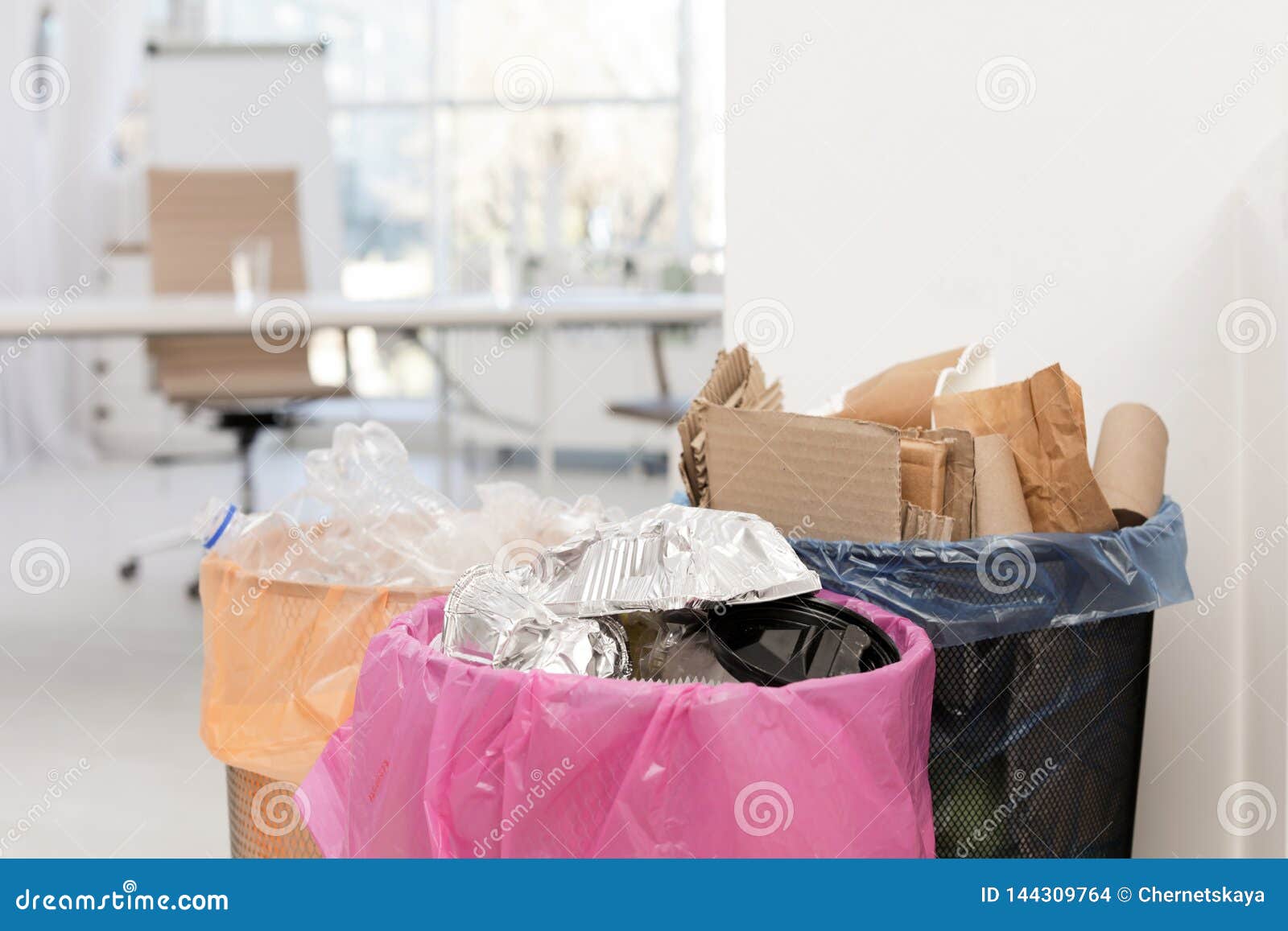 Full Trash Cans in Modern Office. Waste Recycling Stock Photo Image