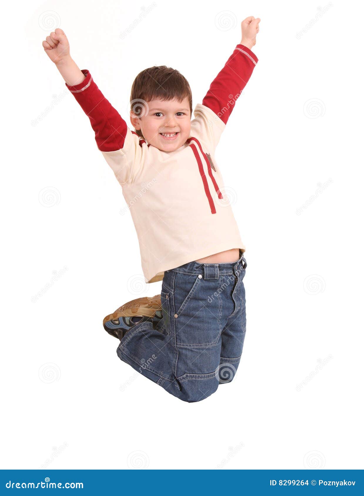 fun boy in jeans high jump.