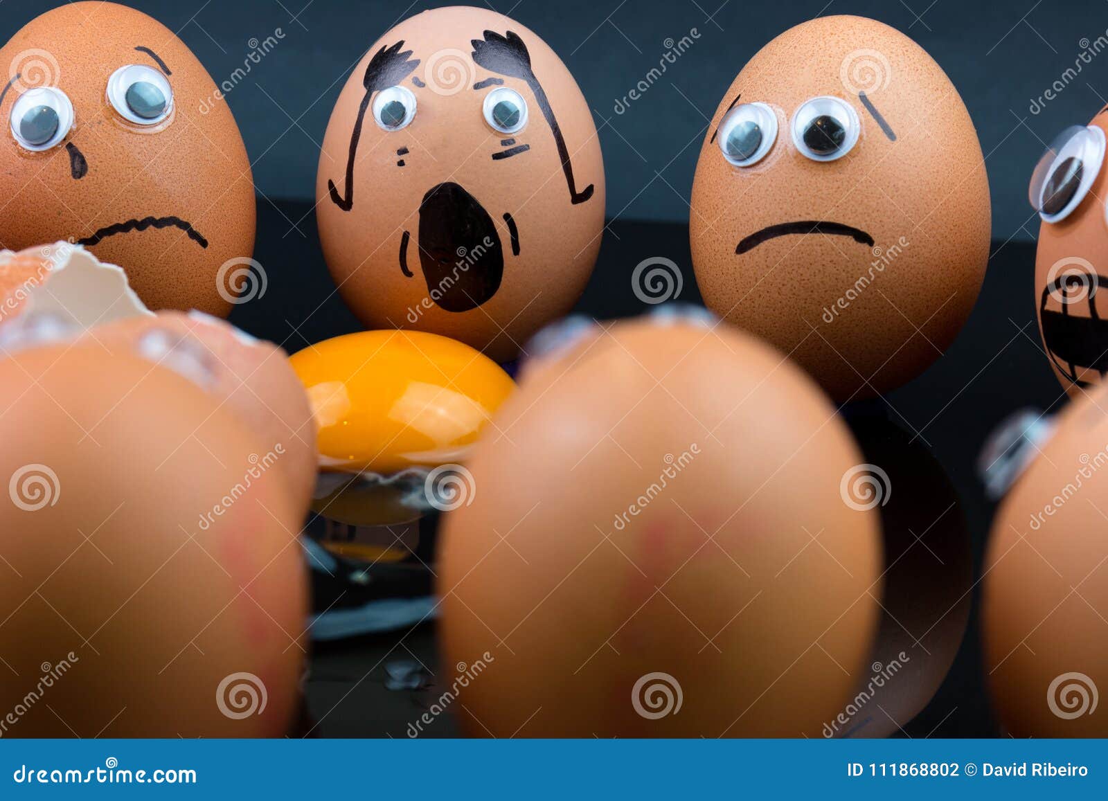 Fun Concept Raw Eggs with Googly Eyes and Drawn Features in Shock
