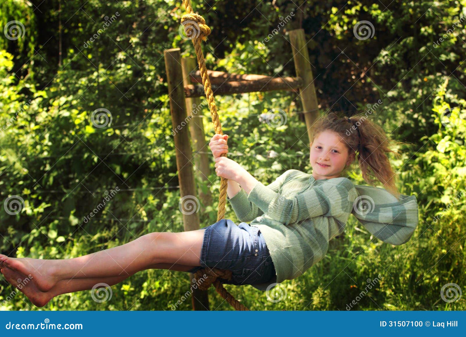 Fun on the Ropes stock photo. Image of grass, girl, rope - 31507100