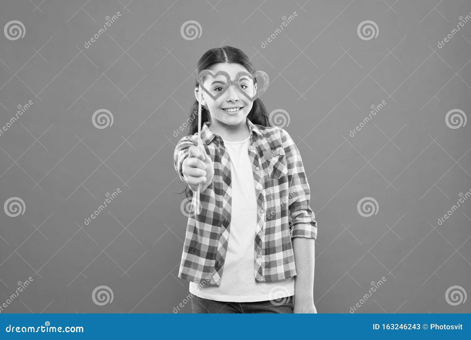 Fun Valentines Props. Cute Kid Smiling with Fancy Party Props on Orange ...