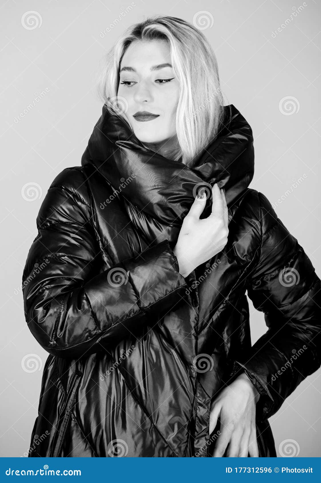 Funky beauty. woman in padded warm coat. happy winter holidays. Xmas coming. girl in puffed coat. faux fur fashion. flu and cold. seasonal fashion. beauty in winter clothing. cold season shopping.