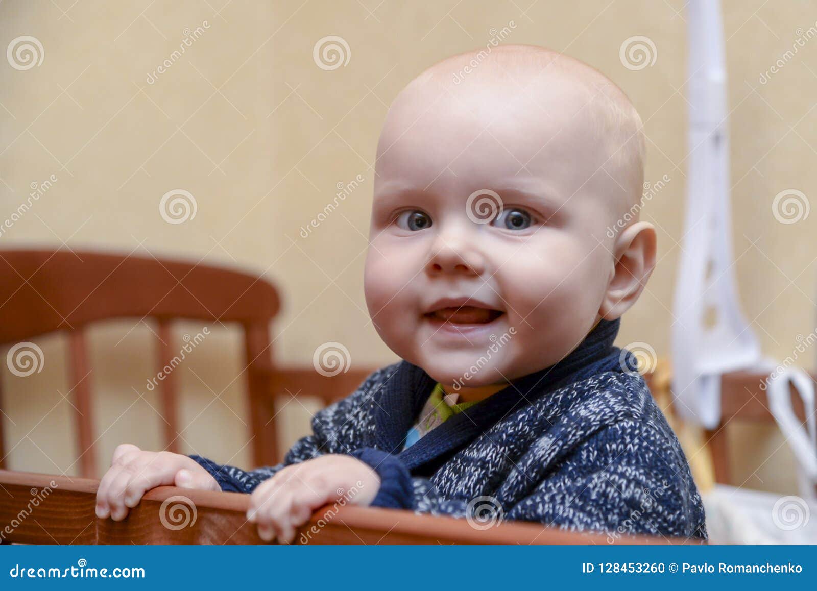 Funny Baby Boy Standing in a Crib Stock Photo Image of face, hold