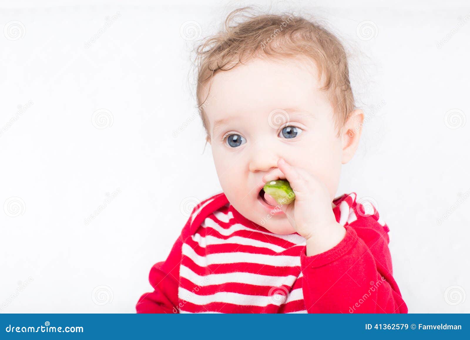 Funny Baby Eating a Cucumber Stock Image Image of child, background