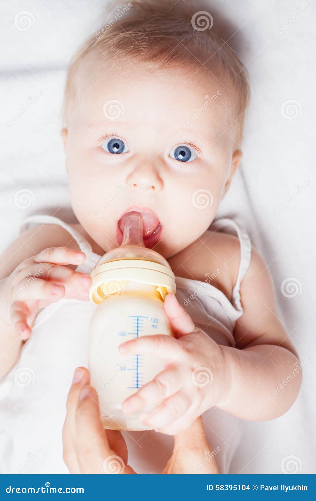 Funny Baby Holding a Bottle with Mothers Breast Milk Stock Photo - Image of  milk, concept: 58395104