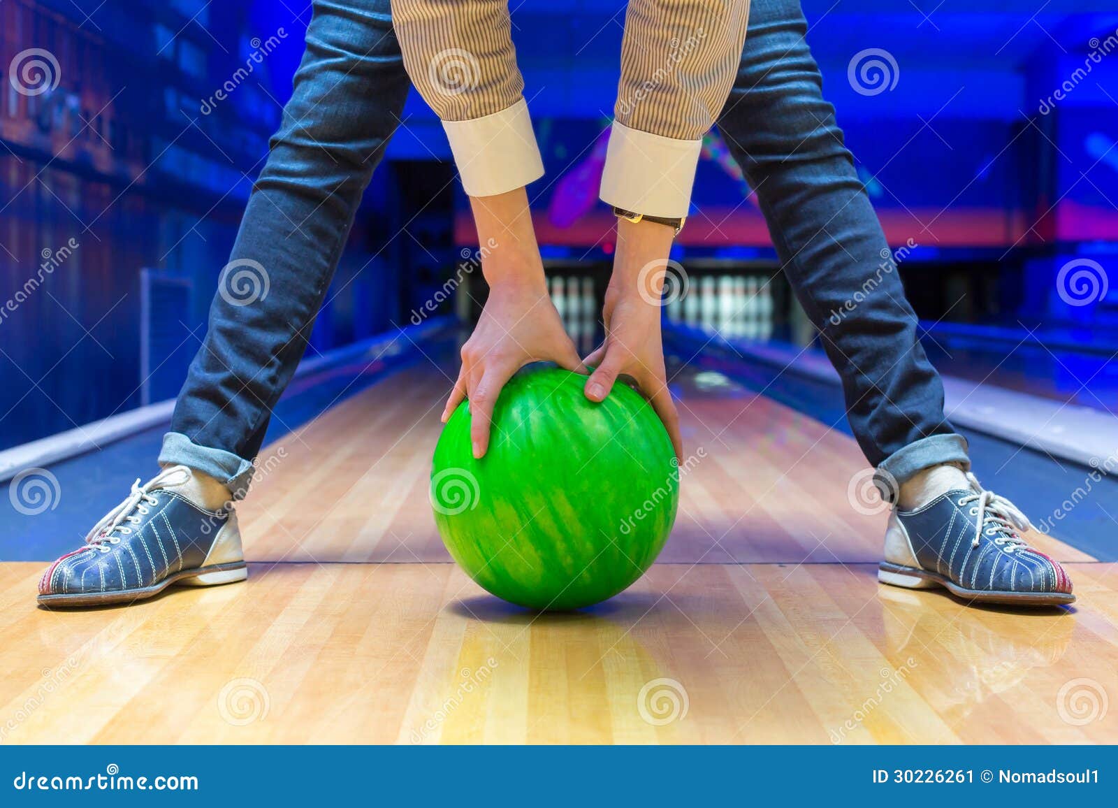 beginner aiming to bowling pins