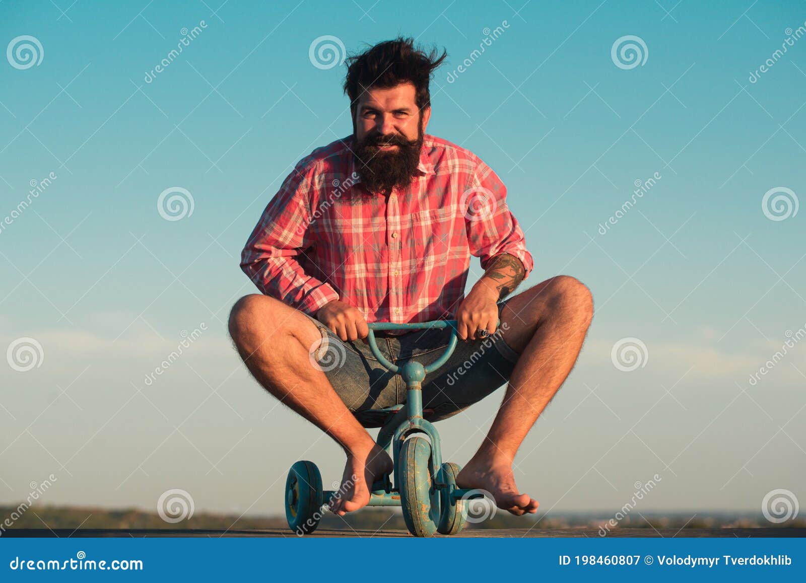 Funny Biker. Man Riding a Small Bicycle. Stock Image Image of
