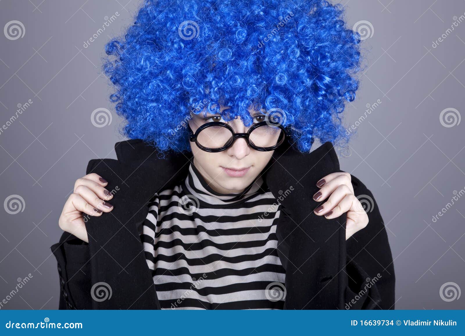 7. Teenager with dark blue hair and glasses - wide 7