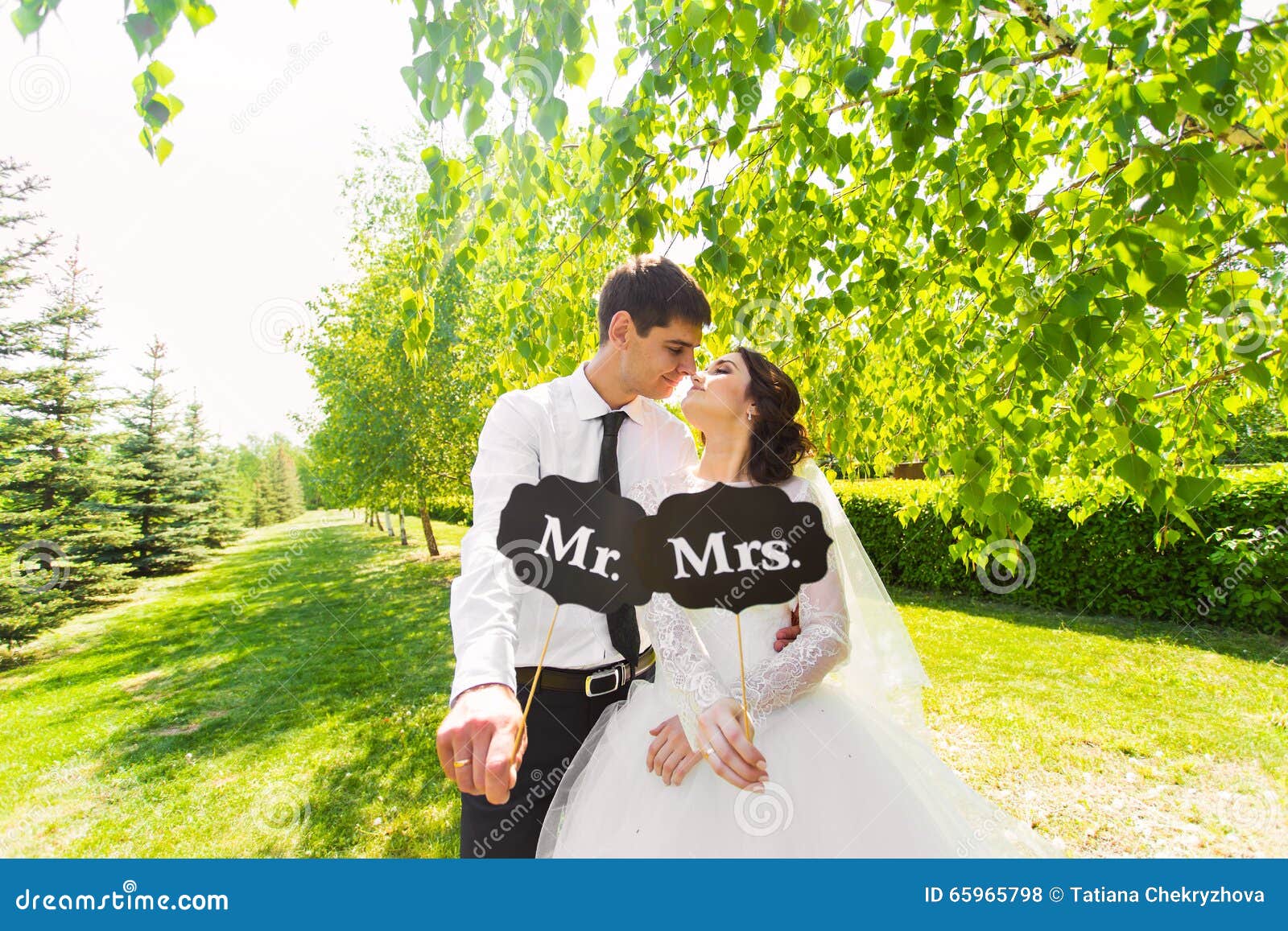 Funny Bride And Groom With Mr And Mrs Signs Happy Wedding Day