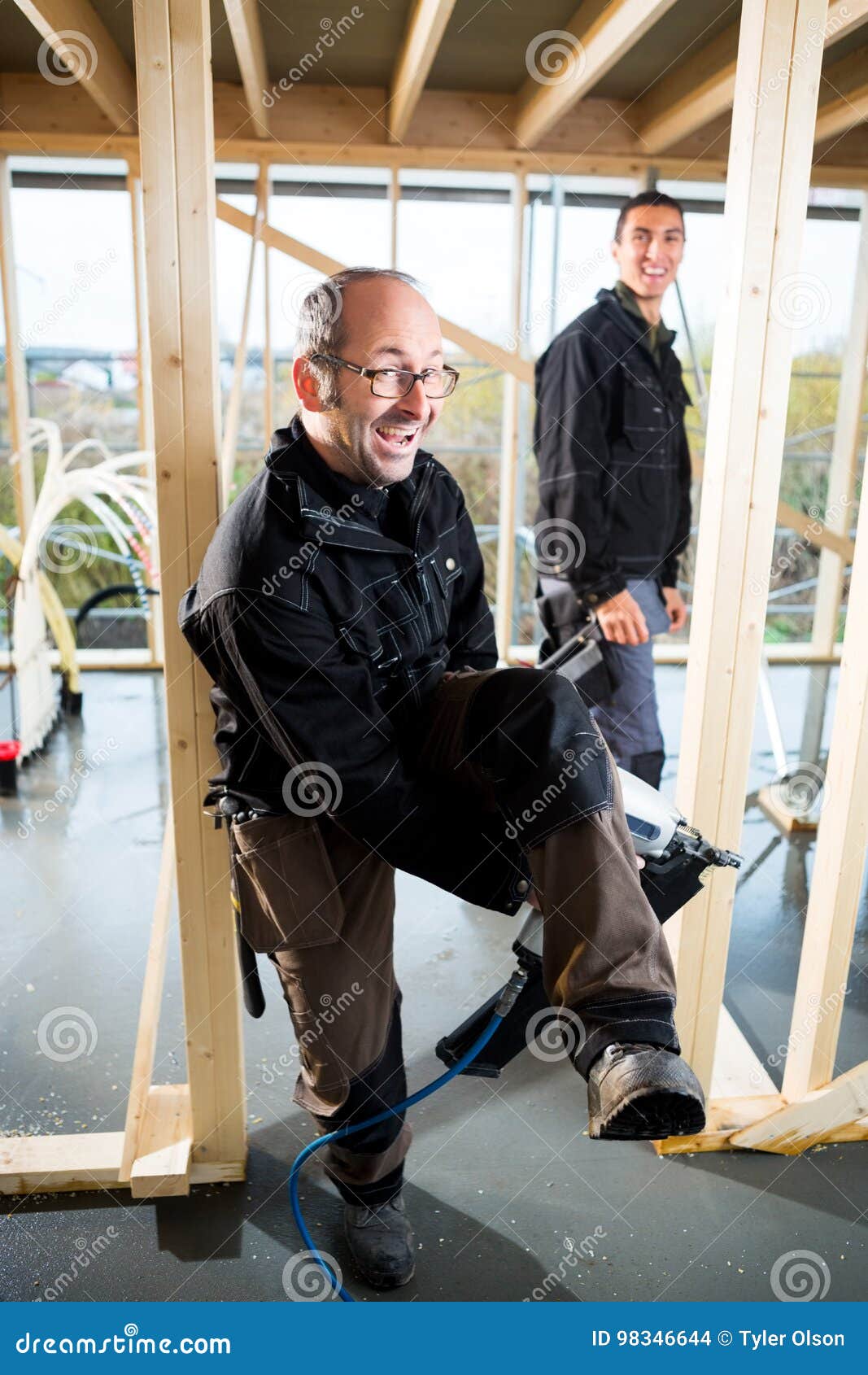 Funny Carpenter with Drill Machine Standing at Site Stock Photo Image