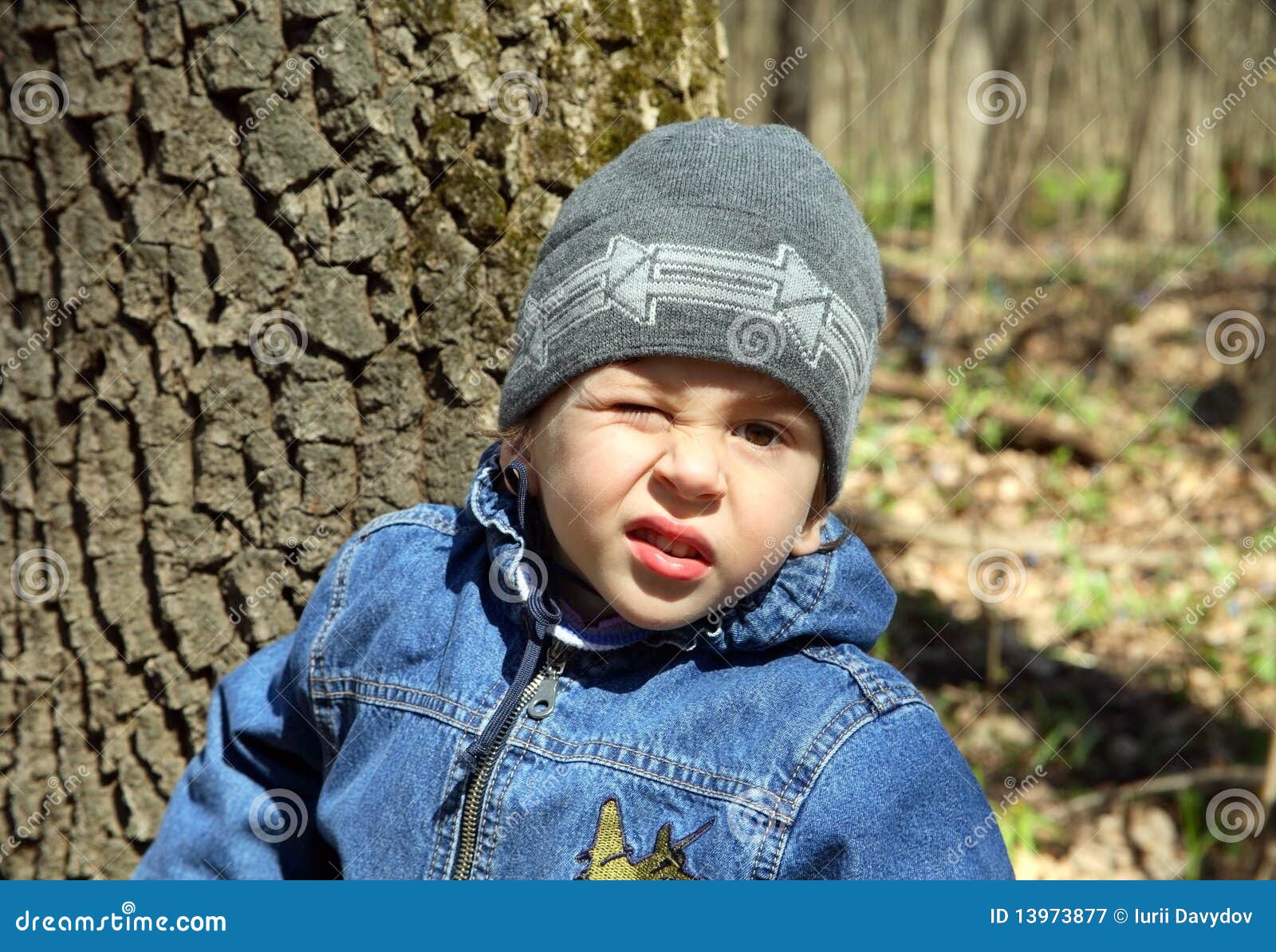Download Funny Child Closing One Eye From The Sun Stock Image ...