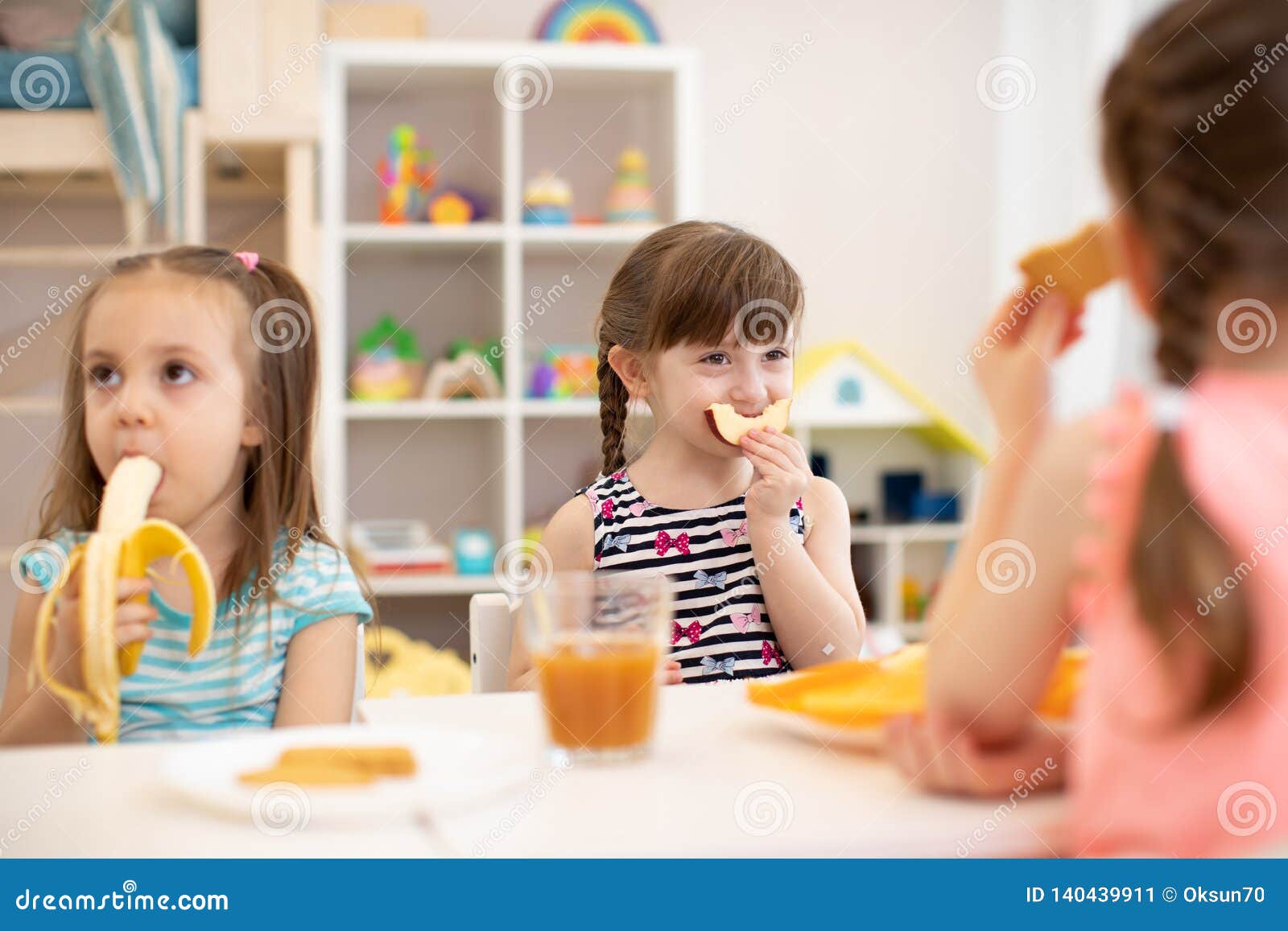 Funny Children Eating Healthy Food Kids Lunch At Daycare Or