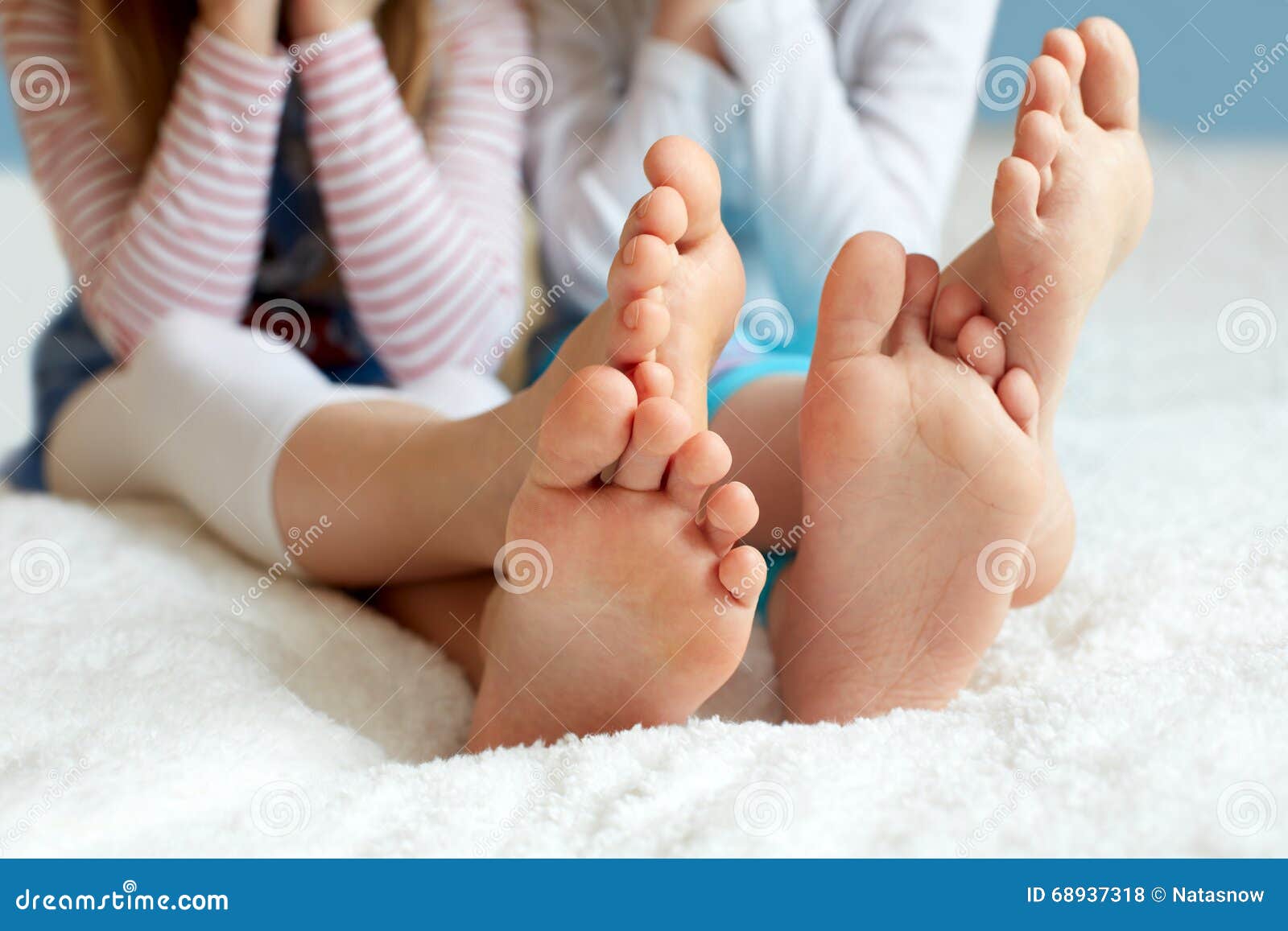 funny children's foots is barefoot, closeup.