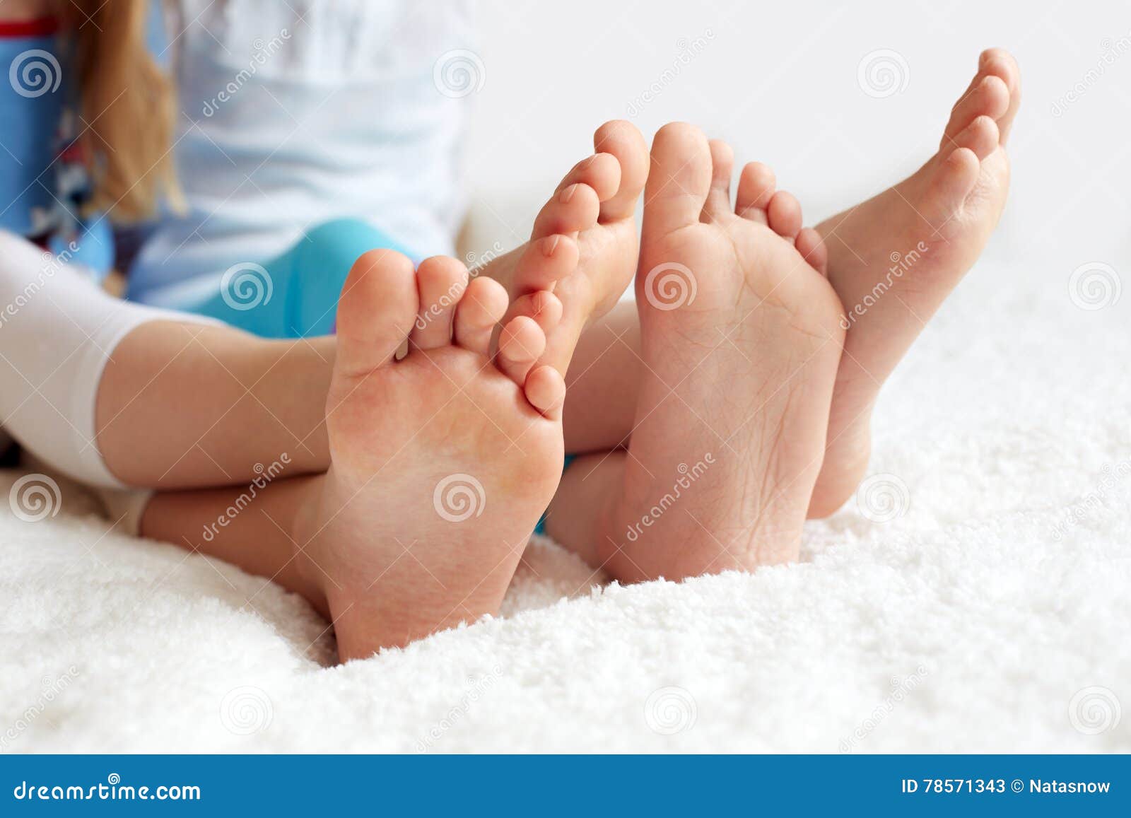 funny children's foots is barefoot, closeup.