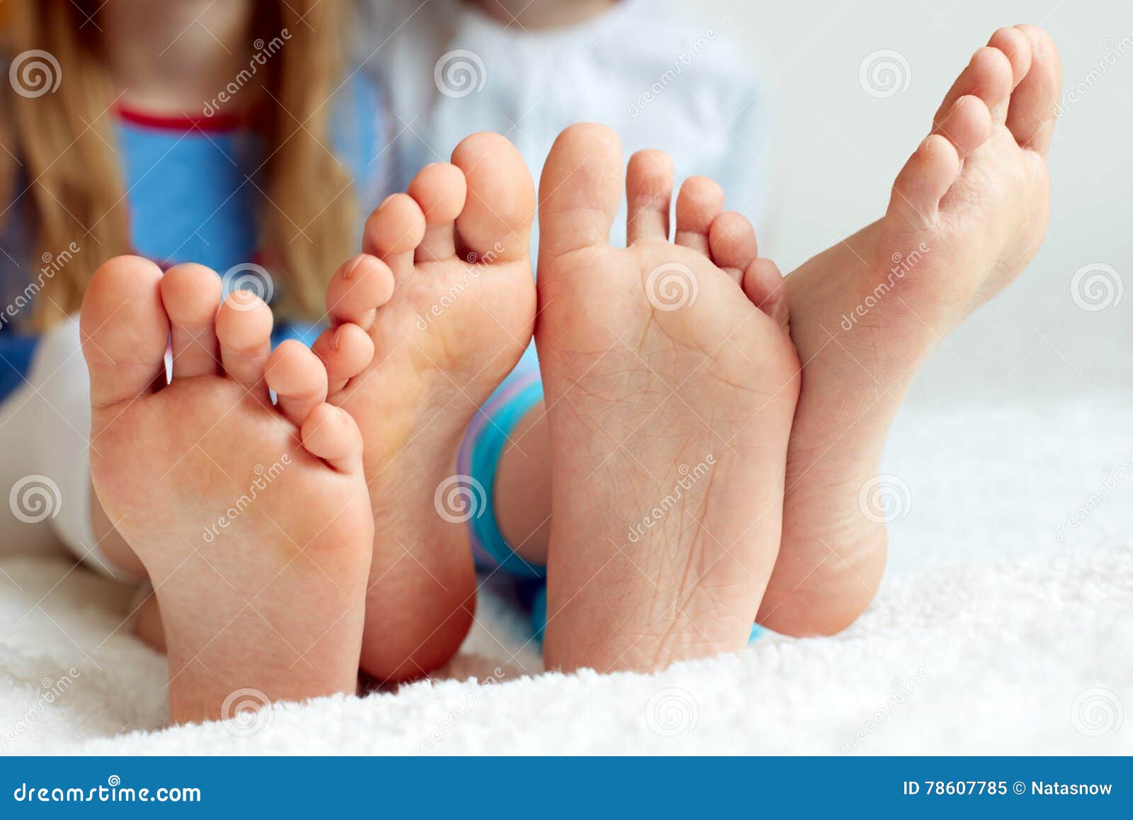 funny children's foots is barefoot, closeup.