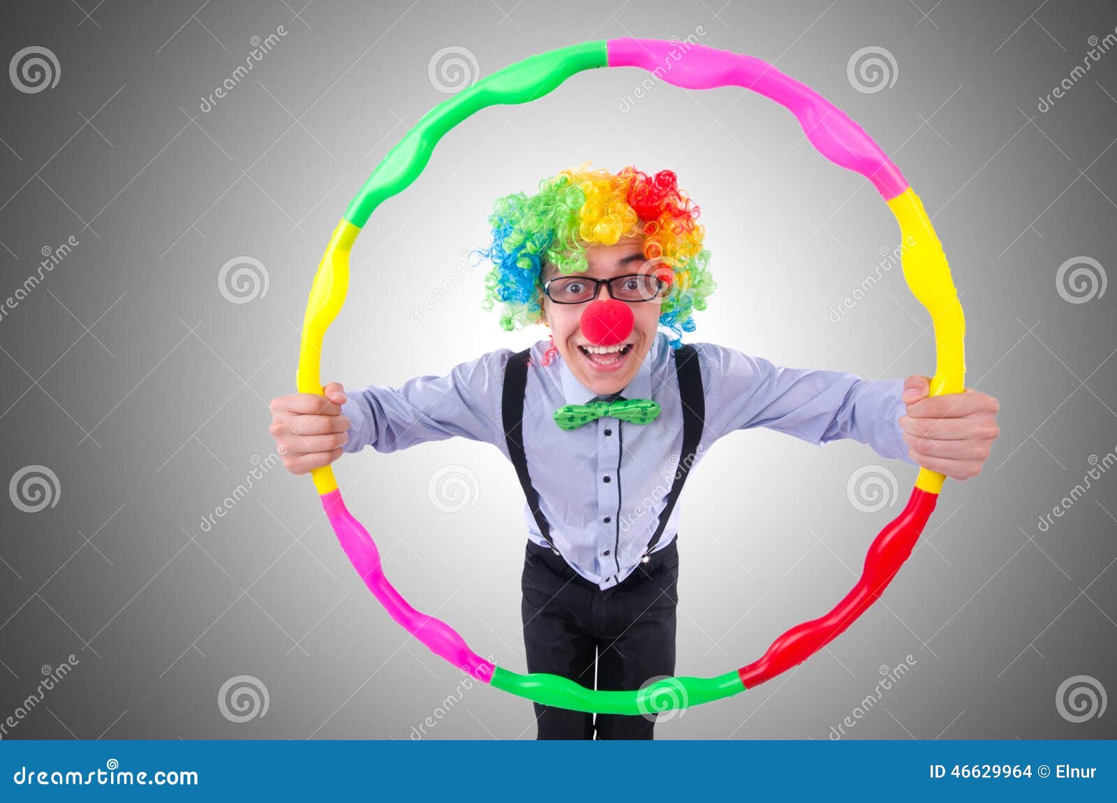 Funny clown with hula hoop stock photo. Image of hoop 46629964