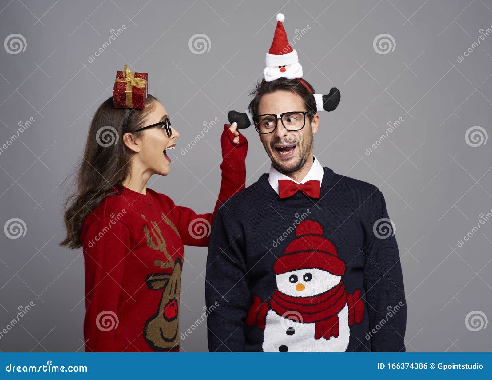 Playful Couple in Christmas Time Stock Photo - Image of adult, humor ...