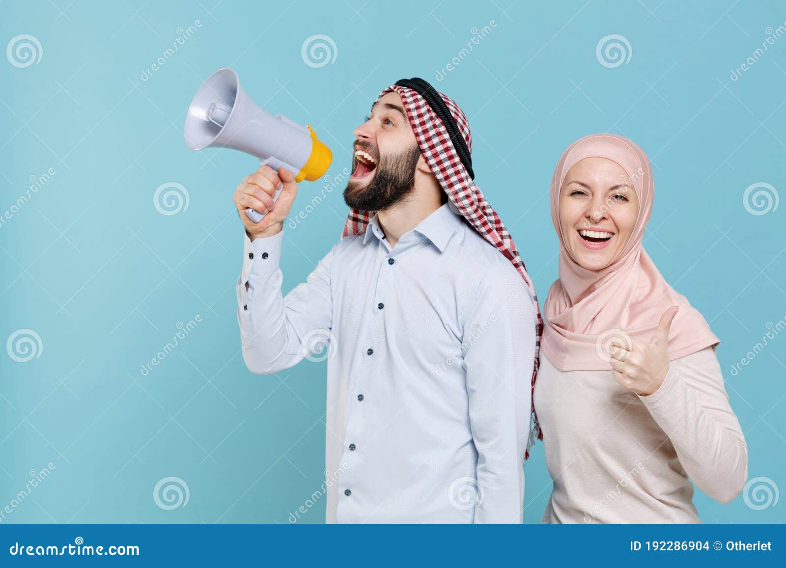 funny couple friends arabian muslim man wonam in keffiyeh kafiya ring igal agal hijab clothes  on blue