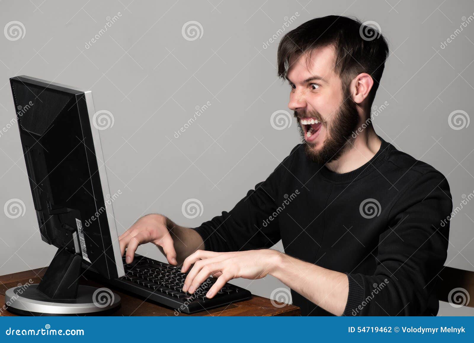 funny-crazy-man-using-computer-gray-back