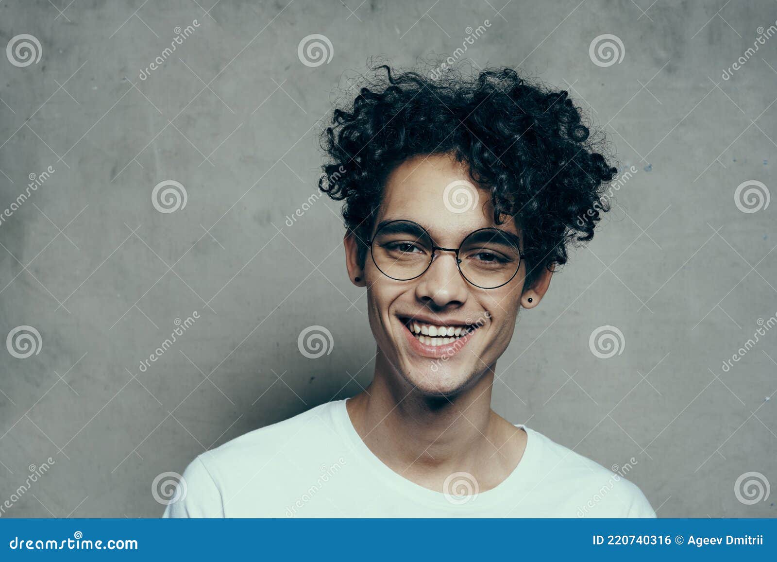 Funny Curly-haired Guy Gesturing with His Hand Wearing Glasses Emotions  Cropped View Stock Photo - Image of modern, curly: 220740316