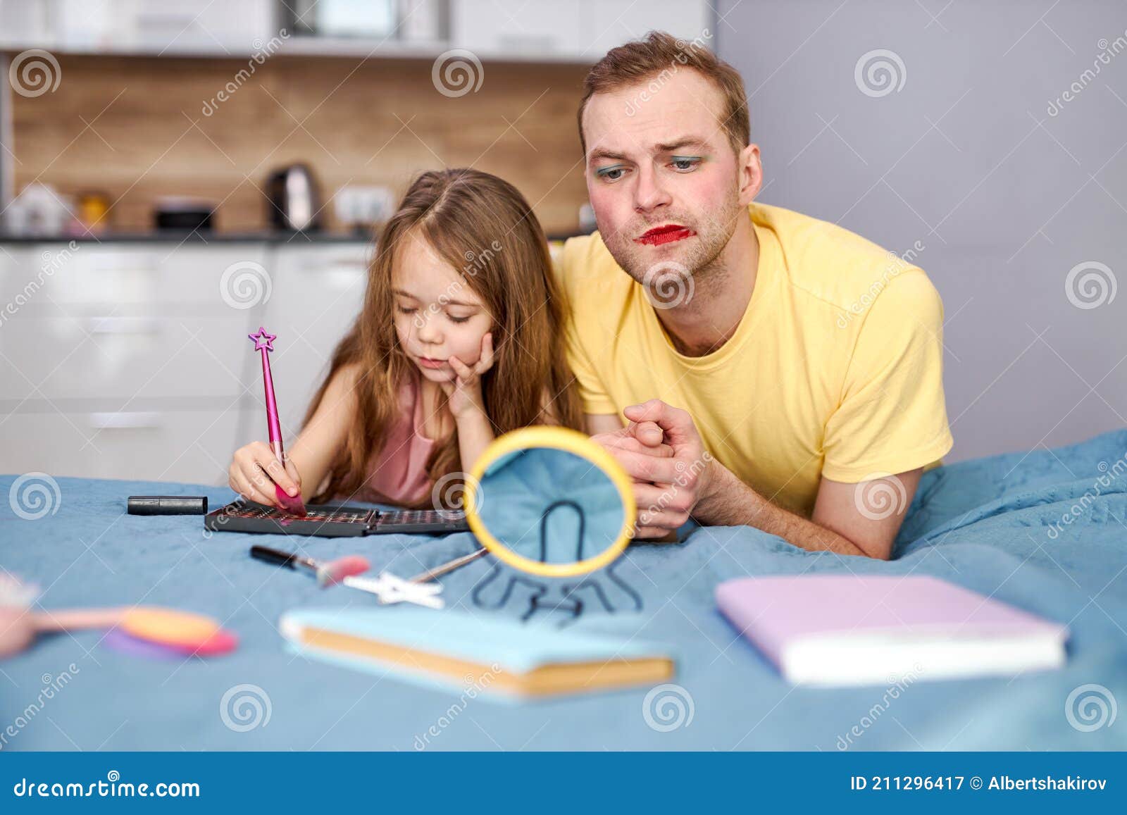 Funny Dad Looking at Result of Playing with Girl, Having Facial Make-up, Having Sad Expression on Face Stock Image - Image of caucasian, bedroom: 211296417 Funny Dad Looking at Result of Playing with Girl, Having Facial Make-up, Having Sad Expression on Face Stock Image - Image of caucasian, bedroom: 211296417