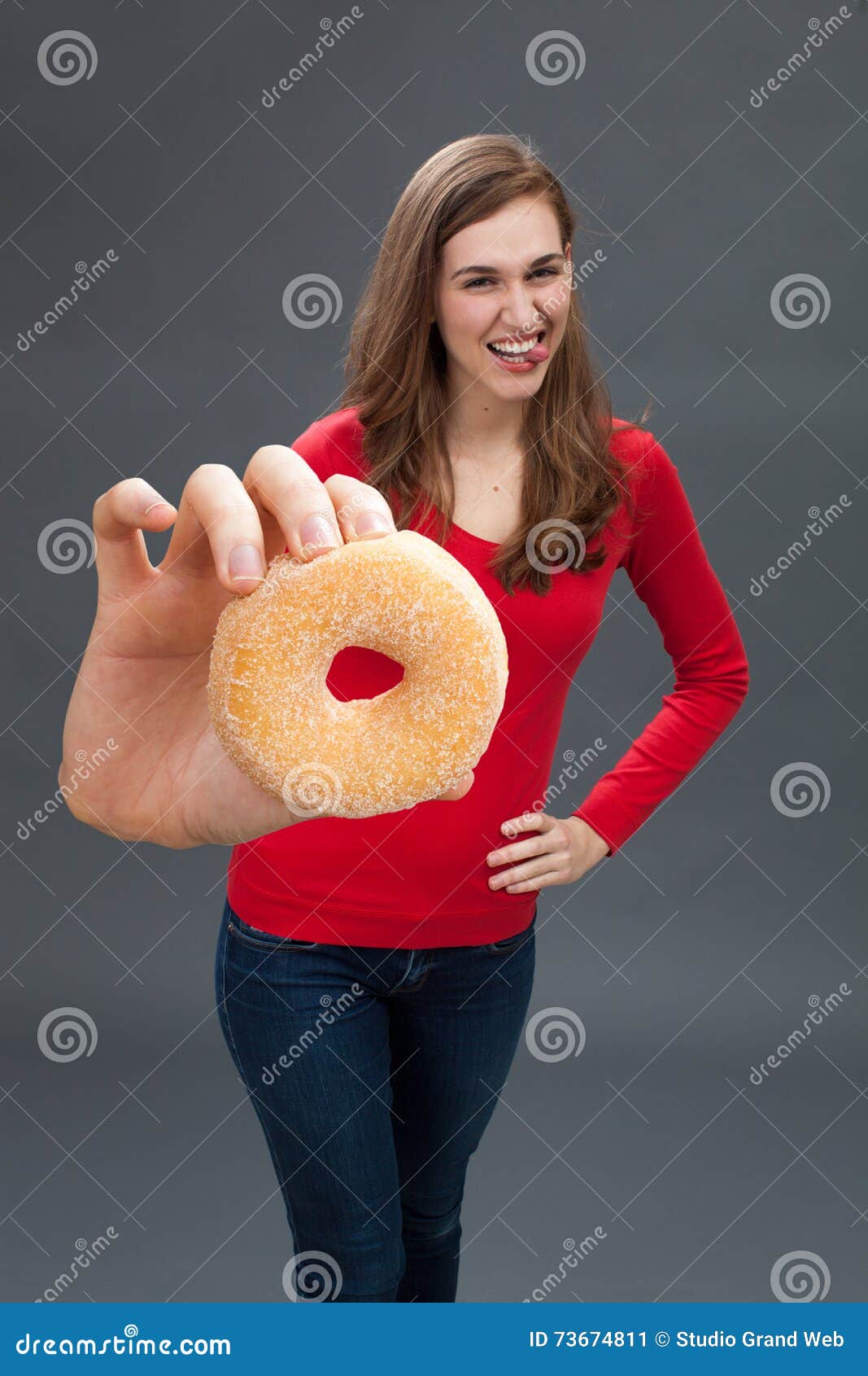 Cheeky Beautiful Young Hispanic Woman Pulling Silly Faces And Sticking 