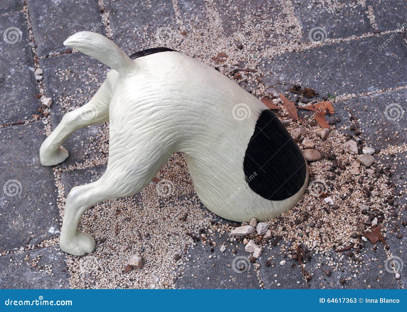 funny figurine of digging dog