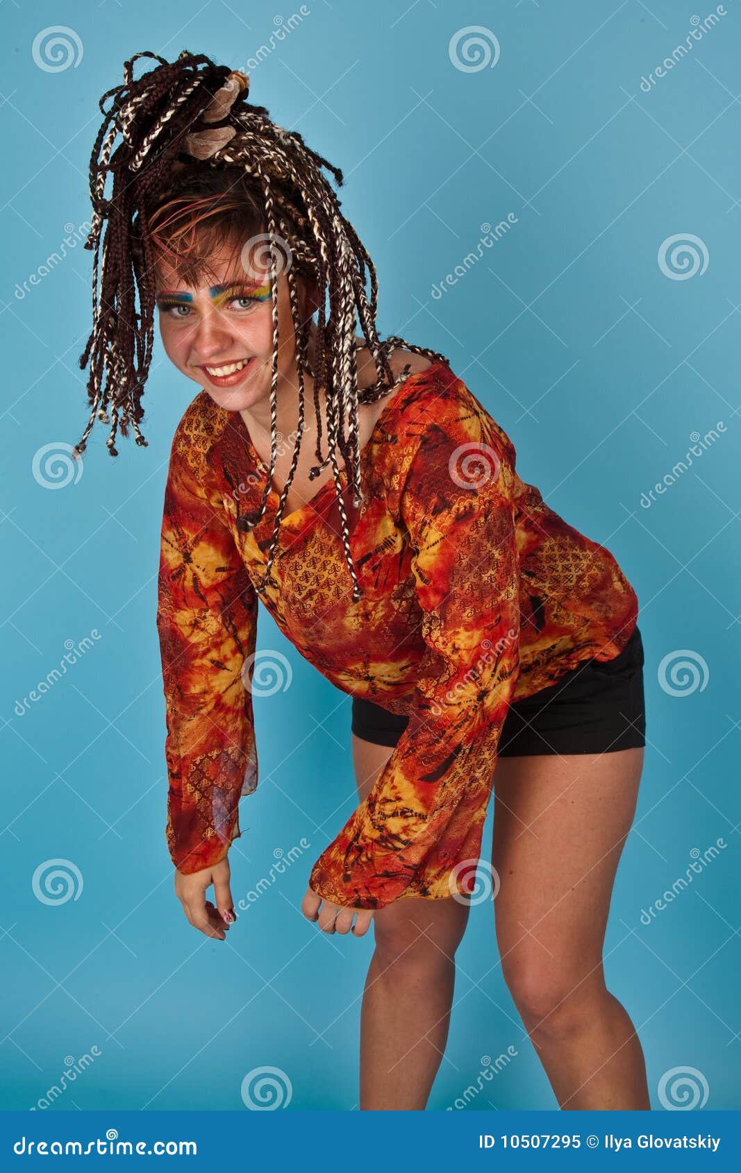 Funny girl with braids posing