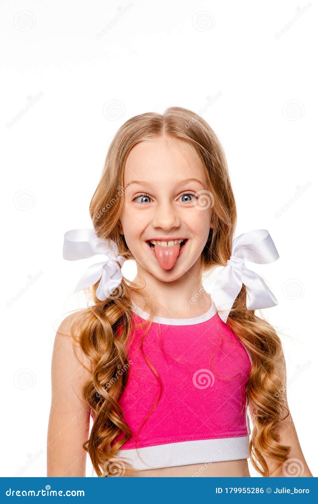 Funny Girl in a Pink Top Shows Tongue and Makes Funny Faces Stock Photo -  Image of tongue, girl: 179955286