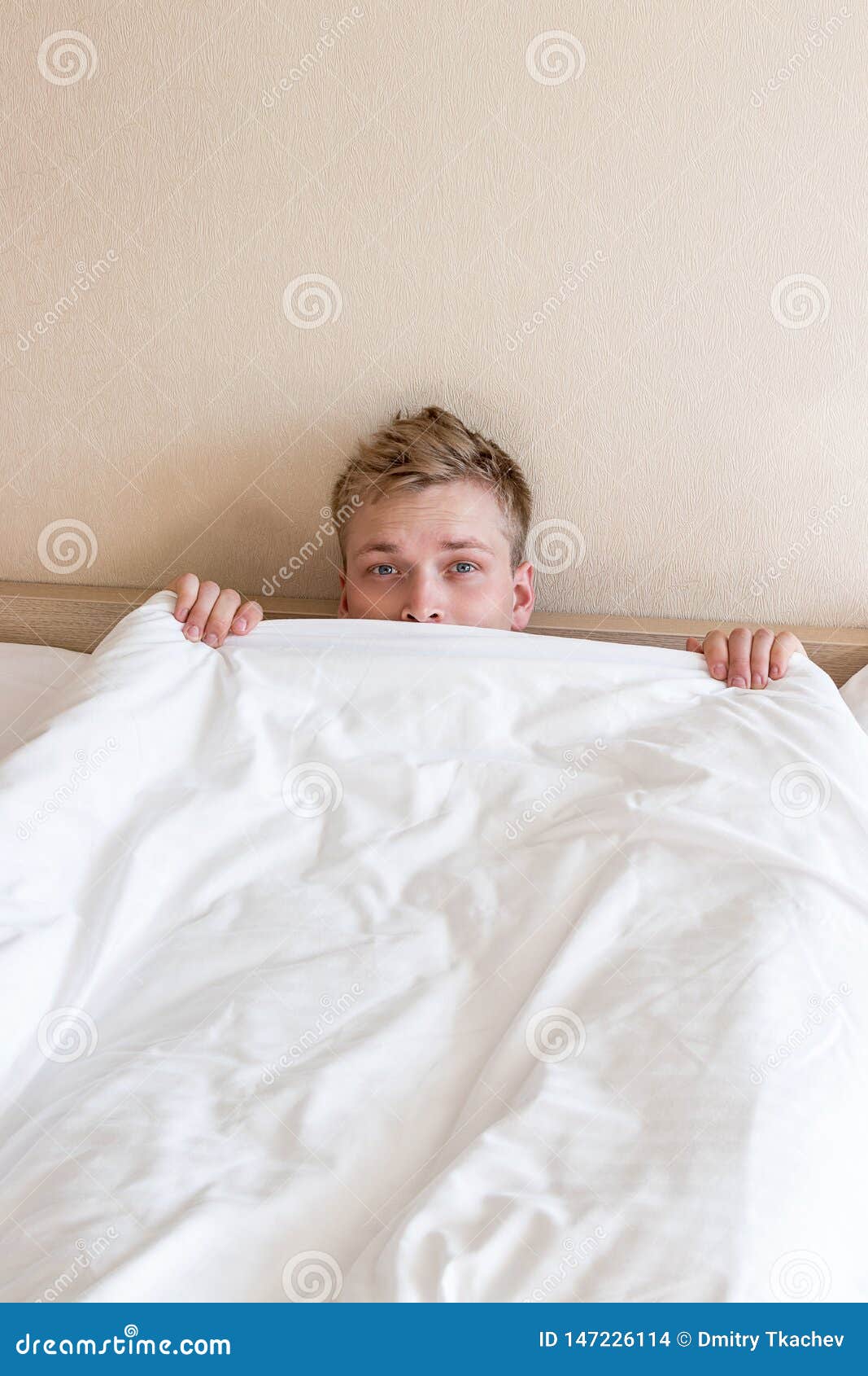 Funny Guy in Bed Under the Blanket after Sleeping. Sleepy Man Waking Up  Stock Photo - Image of morning, awake: 147226114