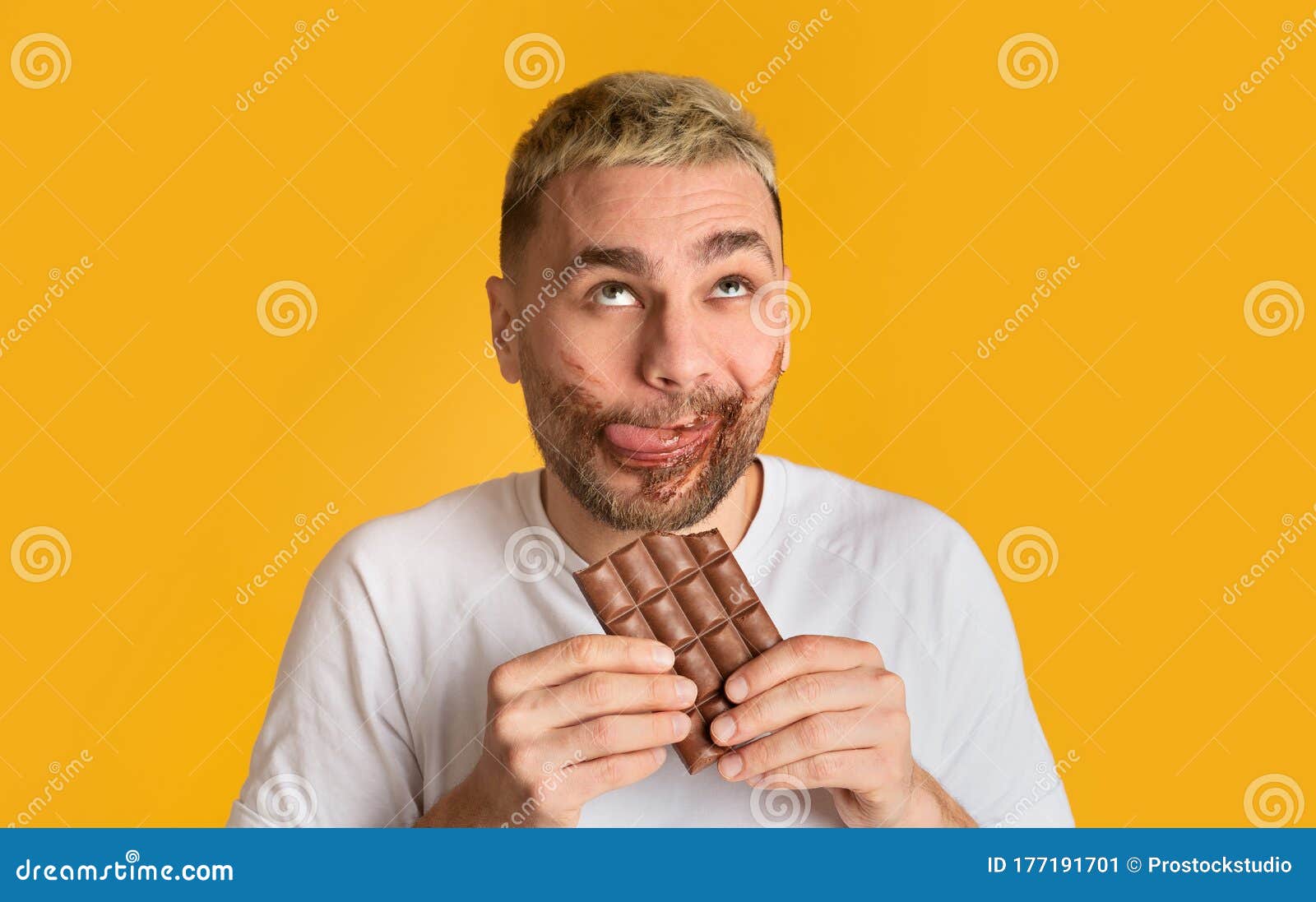 Funny Guy Eats Chocolate and Rolls His Eyes Stock Image Image of