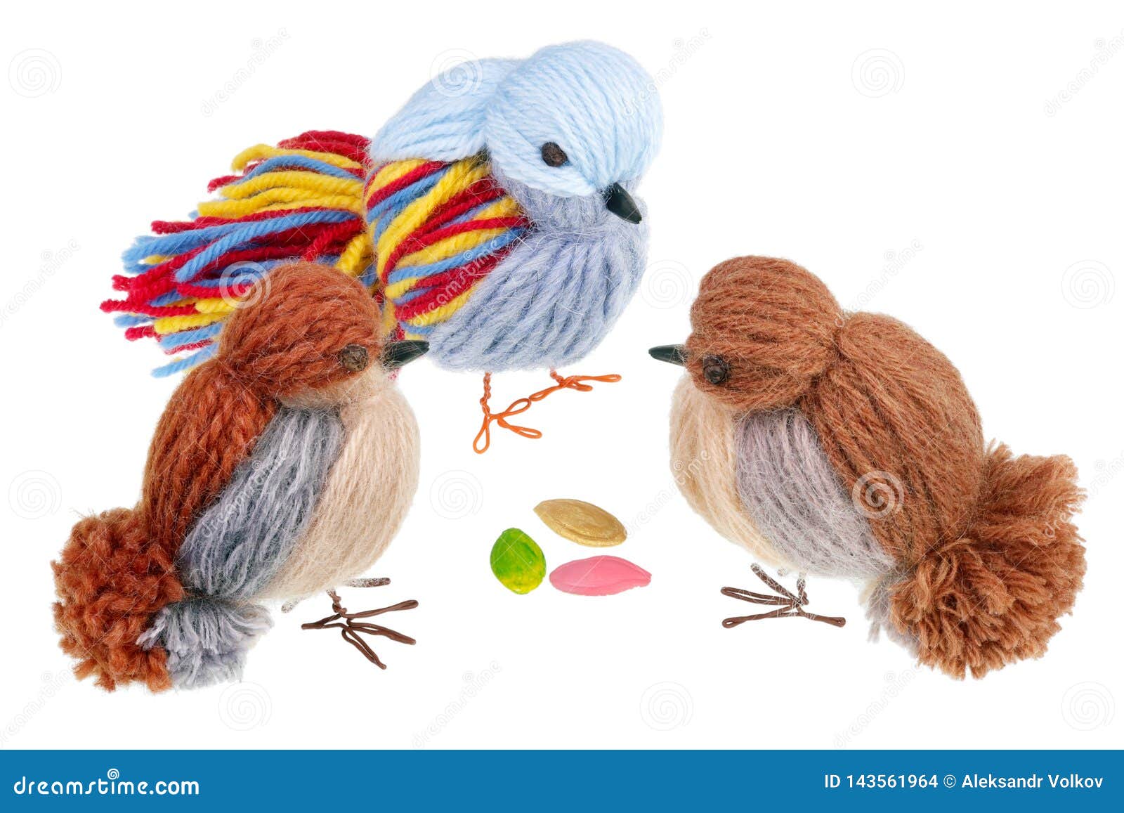 funny handmade easter birds are made of thread and peck  pumpkins  seeds 