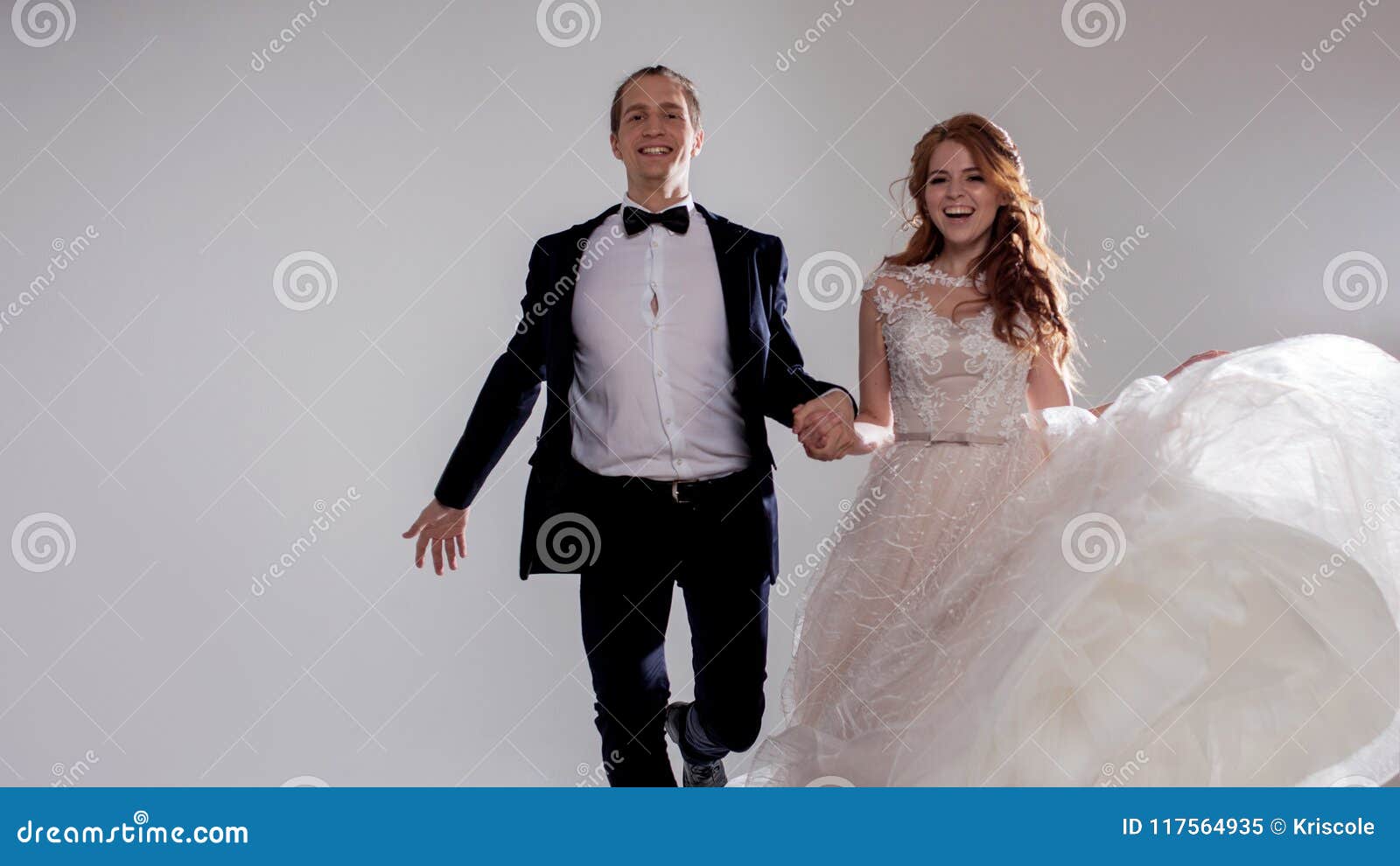 Funny and Happy Bride and Groom, Dance and Jump with Happiness, Married.  Studio Portrait, Light Background Stock Image - Image of dance, positive:  117564935