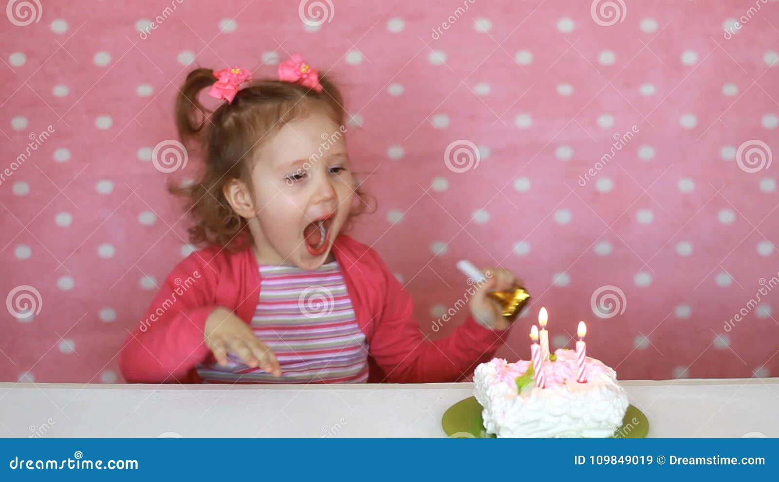 Funny Happy Child Blows Out Candles on Birthday Cake at Party. Cute ...