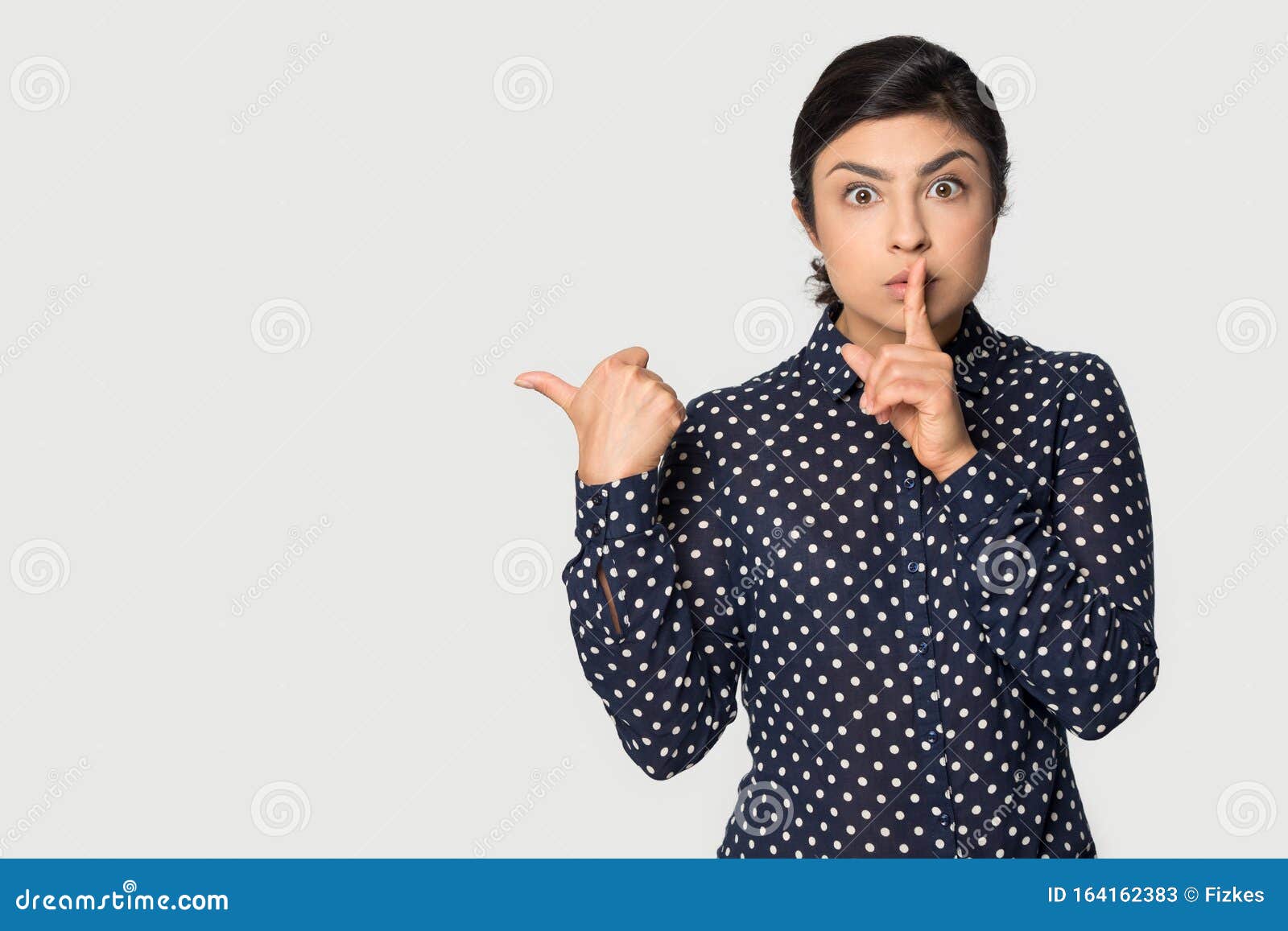 Funny Indian Girl Pointing Finger at Copy Space, Secret Information Stock  Image - Image of background, concept: 164162383