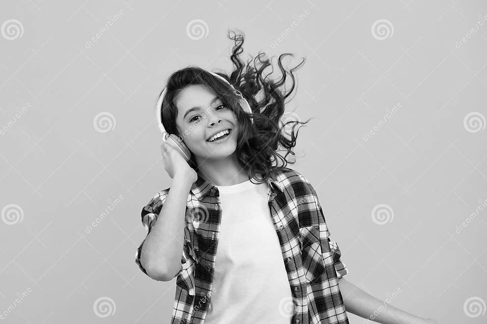 Funny Kid Girl 12 13 14 Years Old Listen Music With Headphones funny-kid-girl-12-13-14-years-old-listen-music-with-headphones