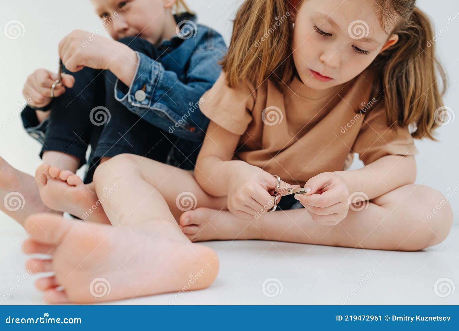 Funny Kids. Little Siblings with Bare Feet Clipping Their ...