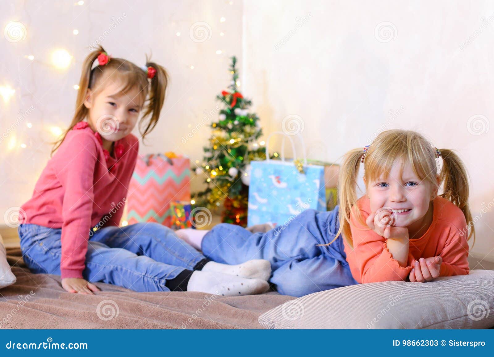 Funny Little Girls Laugh and Talk, Posing Lying on Floor and on Stock Image - Image of festive, child: 98662303 Funny Little Girls Laugh and Talk, Posing Lying on Floor and on Stock Image - Image of festive, child: 98662303
